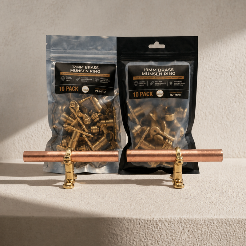 Two brass Munsen ring pipe clips